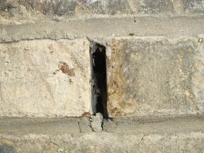 A weep wall exposed and open.